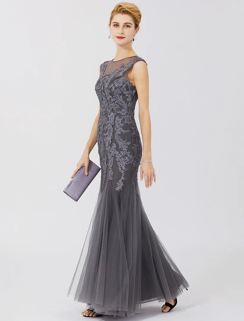 Back view of the floor-length Mother of the Bride dress, showcasing the elegant train and lace.