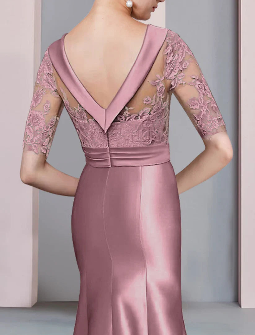 Close-up of the lace and satin fabric on the elegant mermaid trumpet dress.