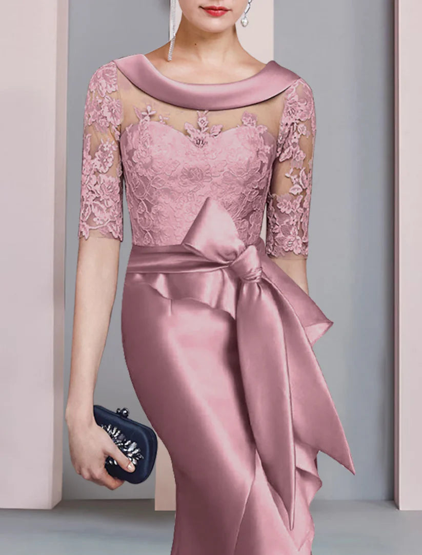 Full length view of the mermaid trumpet dress, highlighting the high-low silhouette.