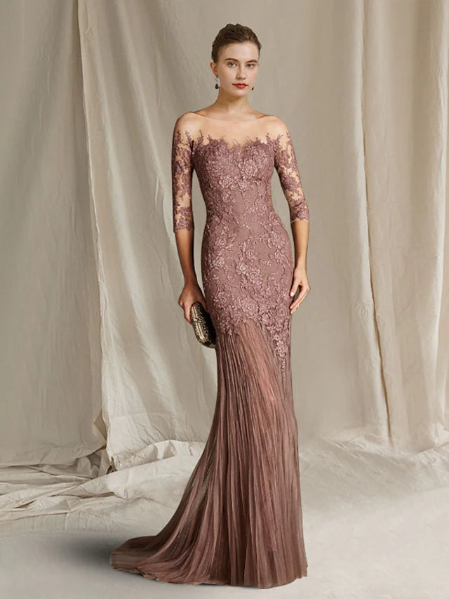 Elegant mermaid trumpet Mother of the Bride dress with jewel neck, half sleeves, lace, and appliques.