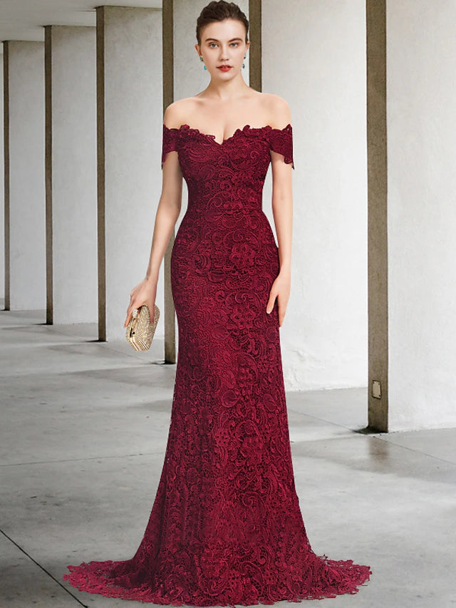 Elegant mermaid trumpet mother of the bride dress with off-shoulder neckline and short lace sleeves.