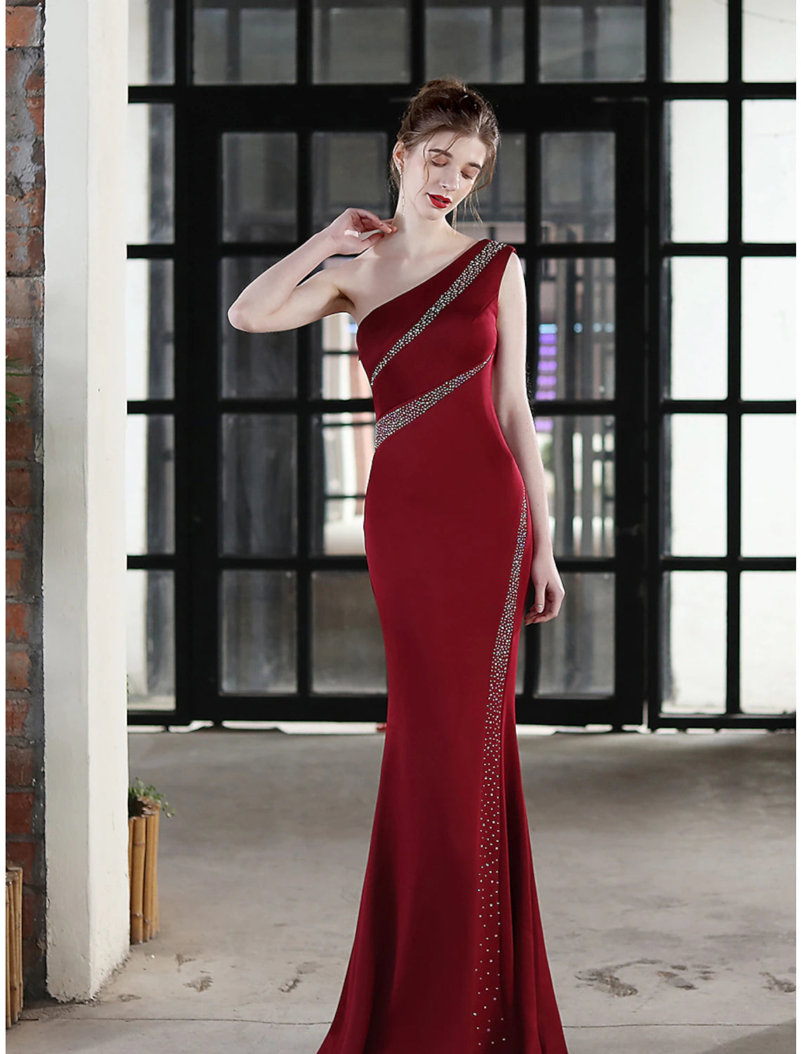 Back view of floor-length stretch satin formal dress.