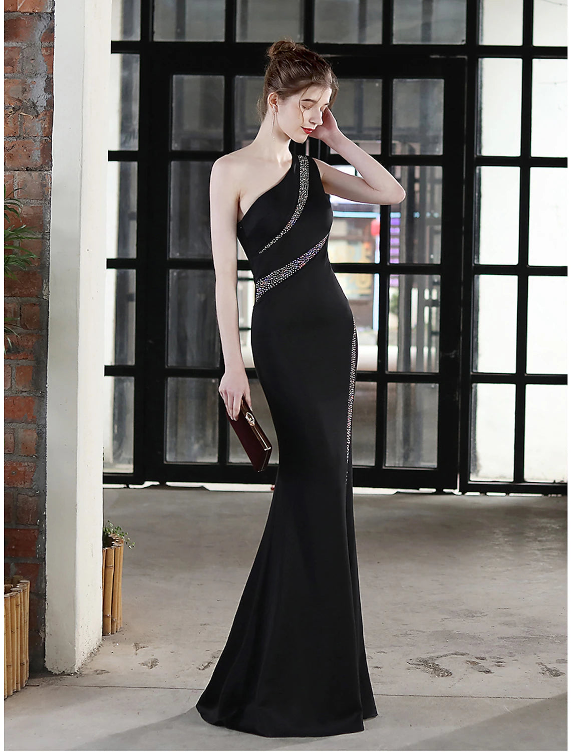 Full view of the mermaid trumpet silhouette evening dress.