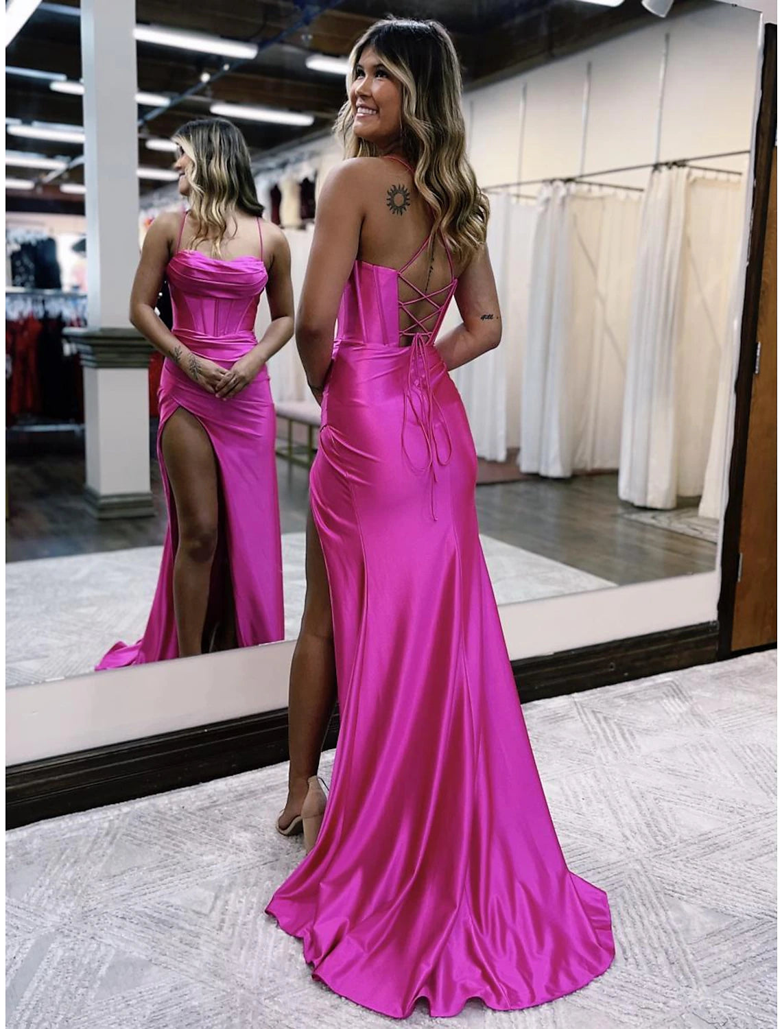 Full length view of the elegant spaghetti strap prom gown.