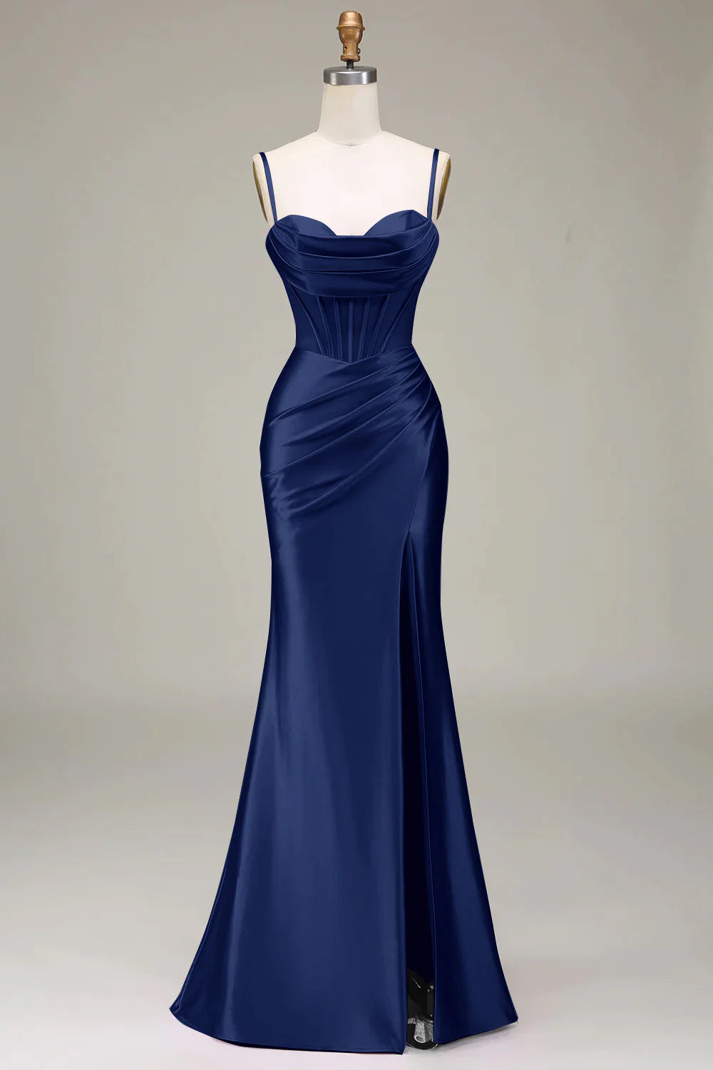 Elegant navy blue mermaid trumpet gown with spaghetti straps and pleats.