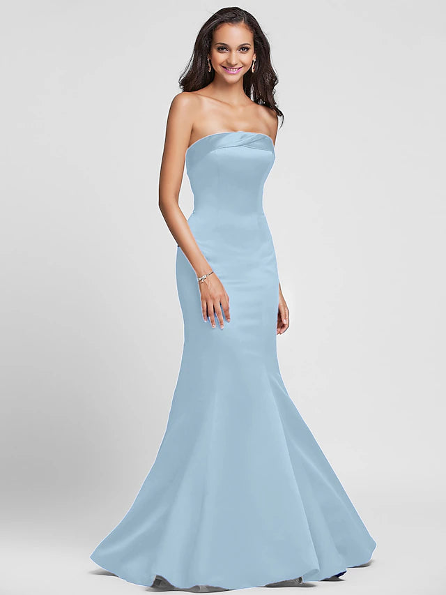 Full view of a satin Mermaid Trumpet gown with elegant side draping.