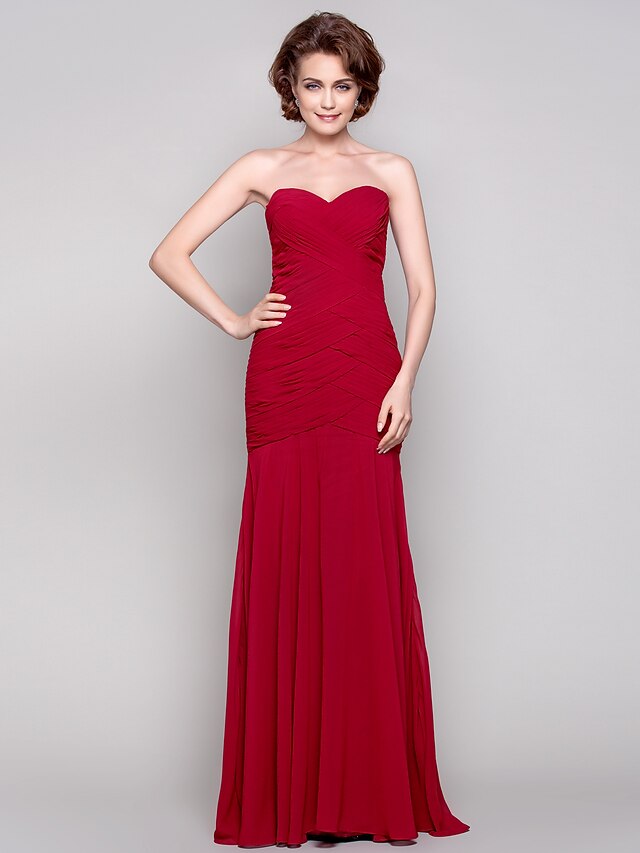 Full length view of a trumpet style Mother of the Bride dress.
