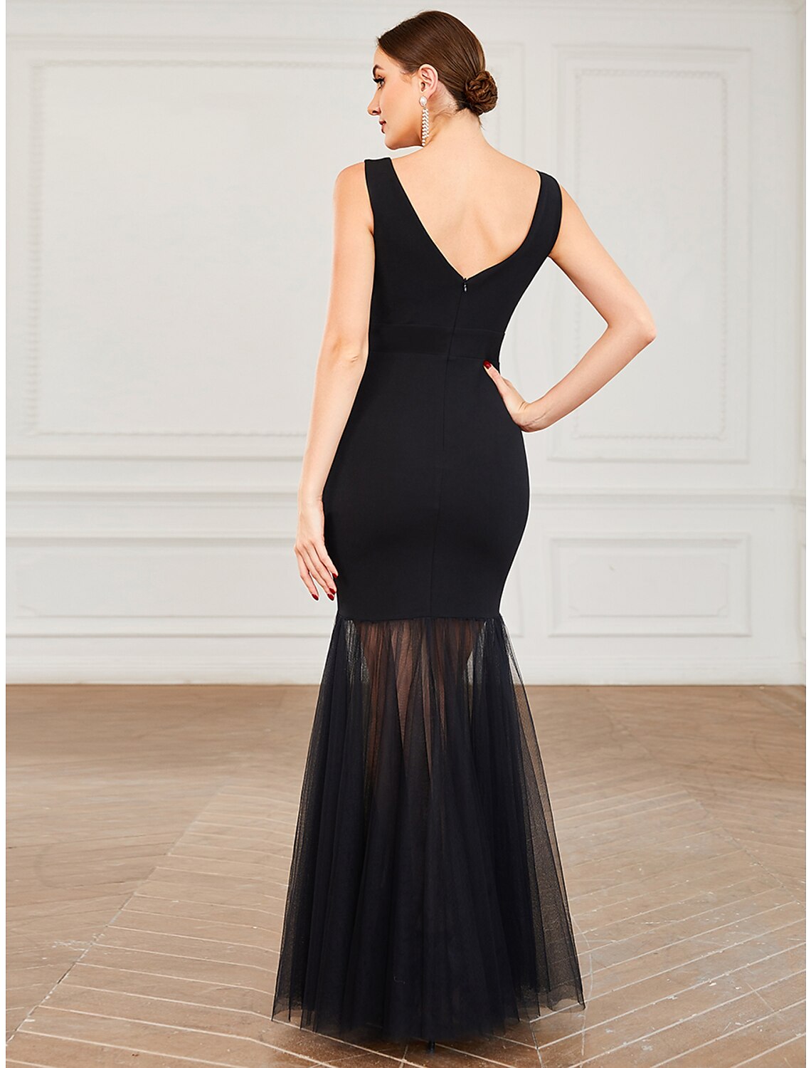 Full length view of the black mermaid trumpet dress, perfect for formal occasions.