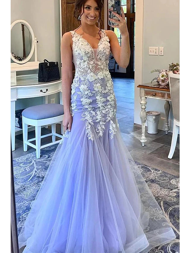 Elegant mermaid trumpet prom dress in tulle with floral appliques and V-neck.