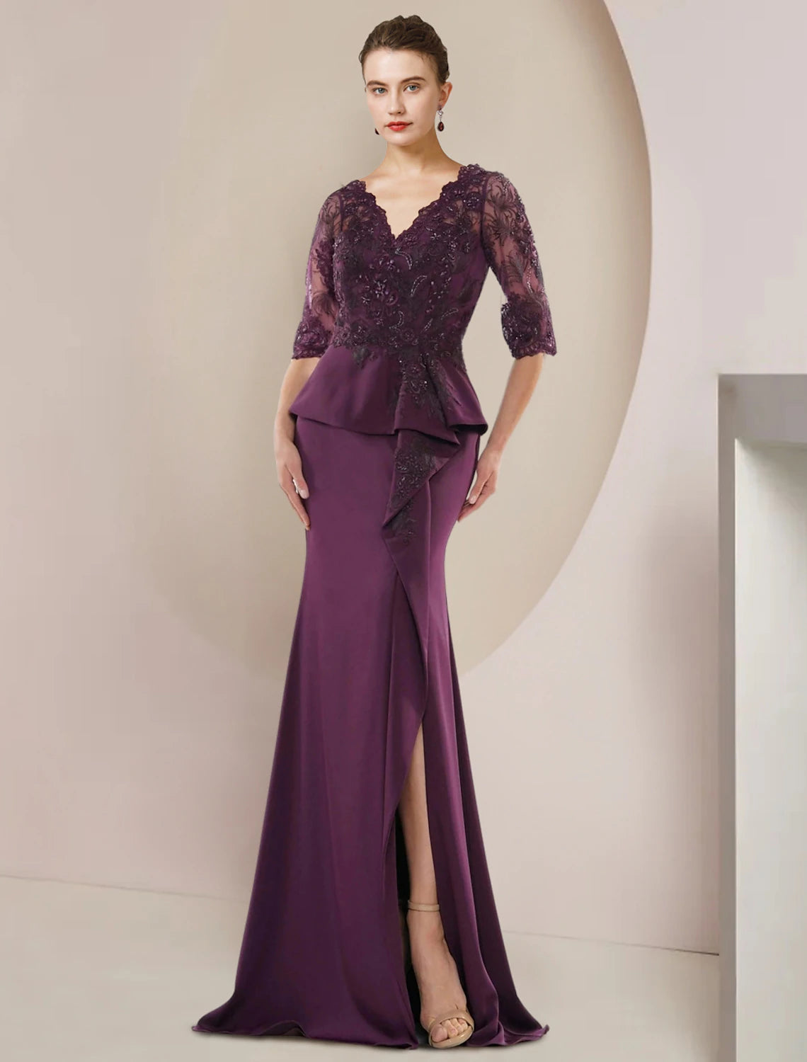 Elegant mermaid trumpet Mother of the Bride dress with V-neck, half sleeves, and lace details.