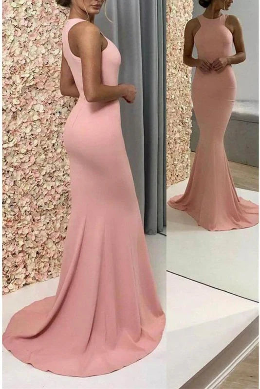 Elegant sleeveless mermaid trumpet prom dress with a V-neckline, flowing to a maxi length.