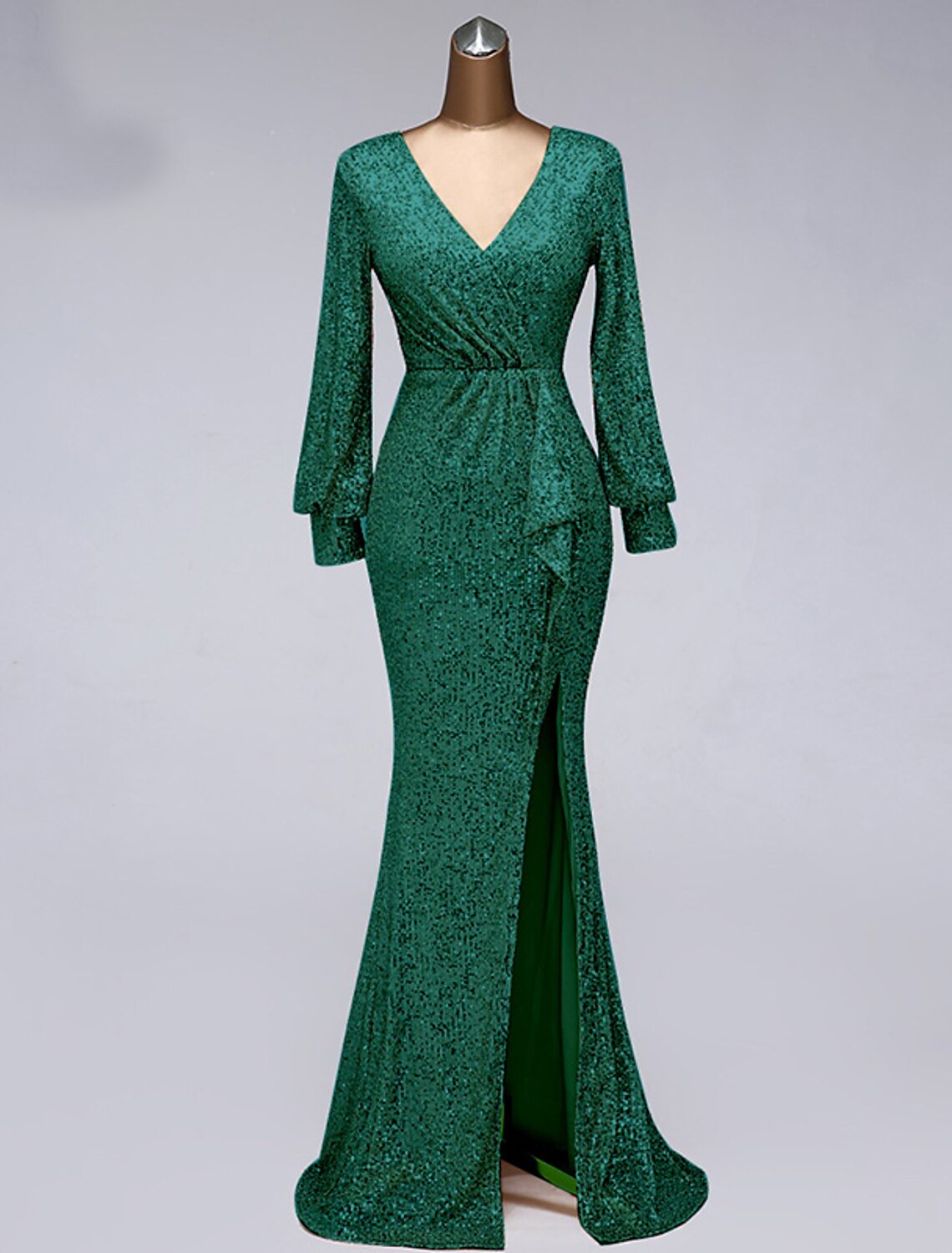 Back view of sequin tulle mermaid gown with floor-length design.