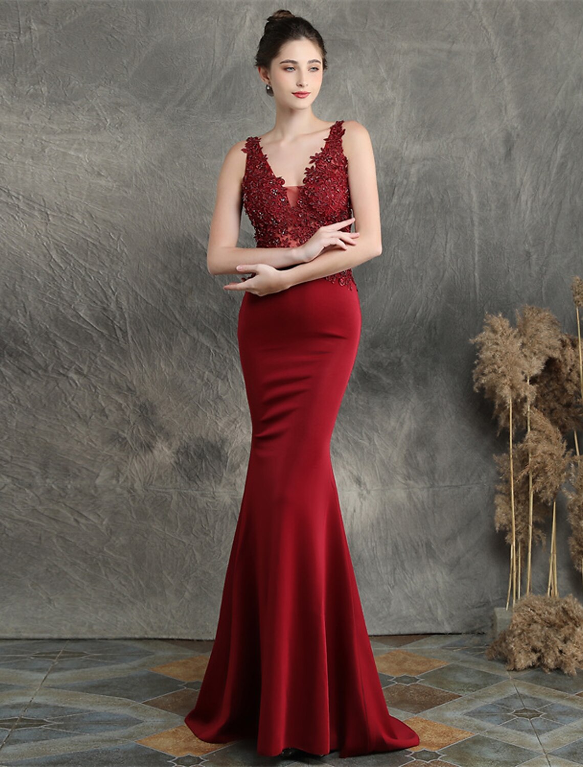 Close-up of delicate beading appliques on the formal evening gown.
