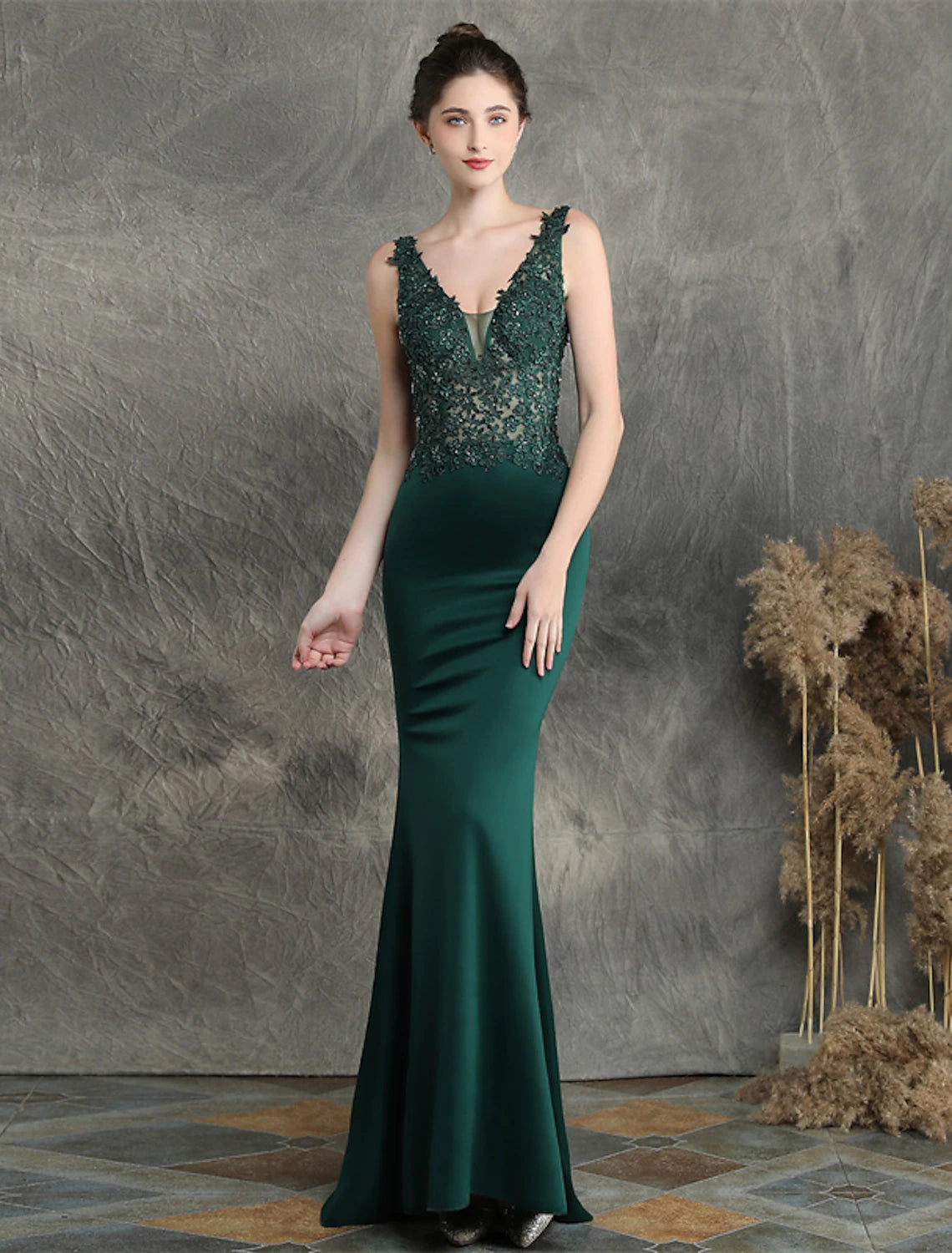 Detail of the sweep train on the elegant Mermaid Trumpet evening gown.