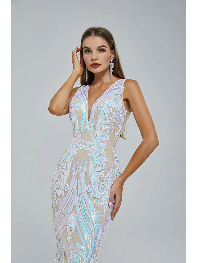Close-up of V-neckline and sequin embellishments on the dress.