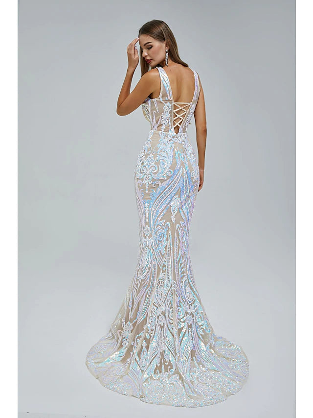 Model wearing a sleeveless sequined mermaid evening gown.