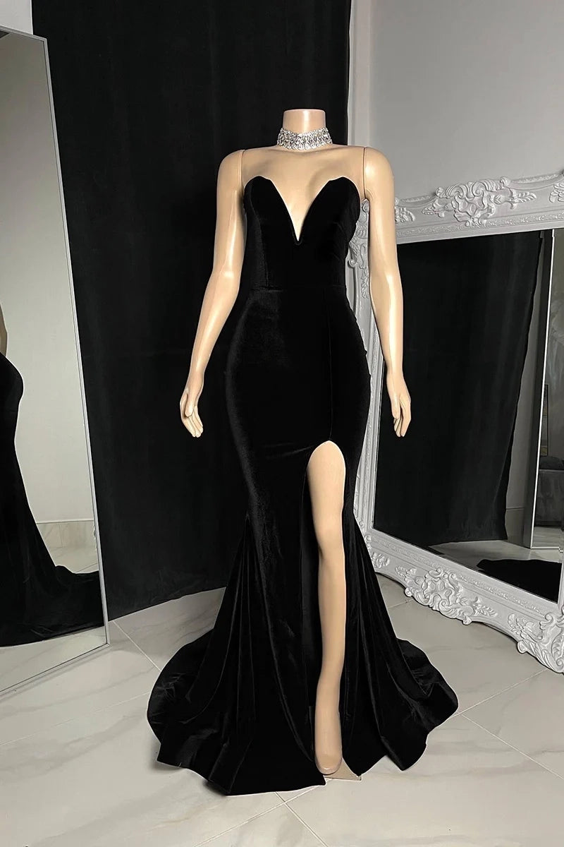 Elegant velvet mermaid prom dress with a strapless neckline and court train.
