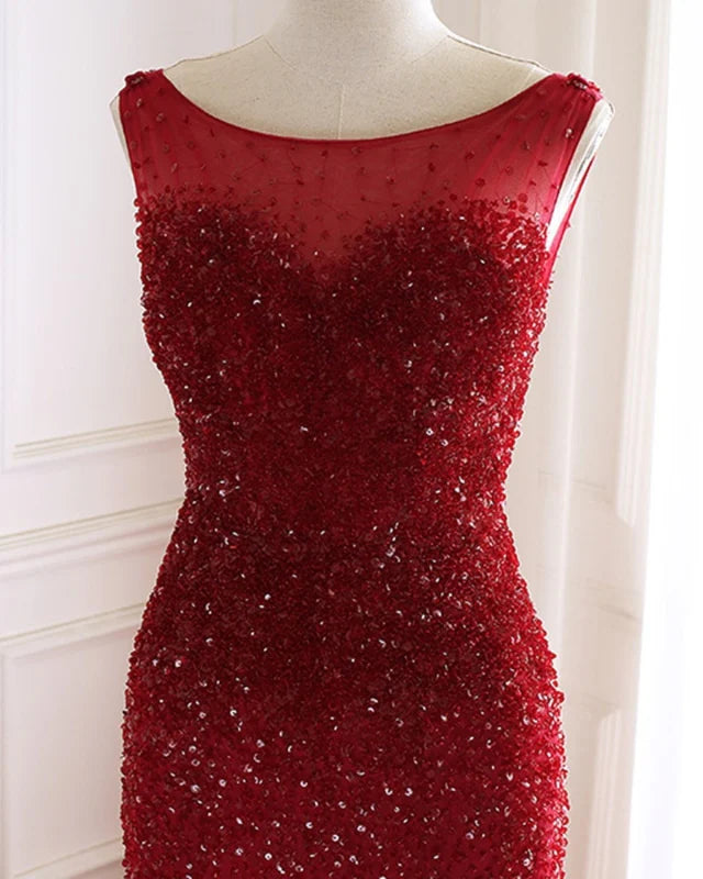 Full view of the elegant mermaid prom dress with a flowing tulle skirt.