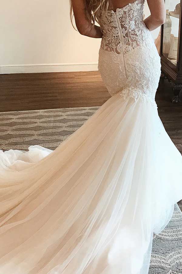 Back view of a Mermaid Tulle Wedding Dress featuring Lace Details.