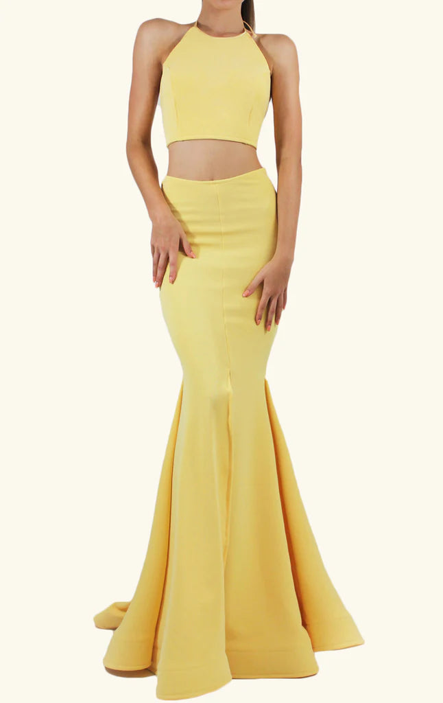 Model wearing an elegant mermaid two-piece prom dress with a sweetheart neckline.