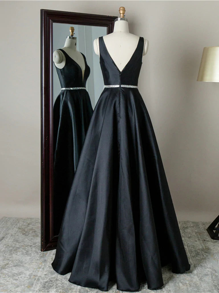 Close-up of the intricate lace detail on the backless V-neck prom dress.