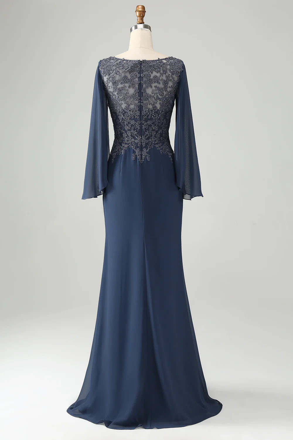 Side view of the navy mermaid mother of the bride gown.