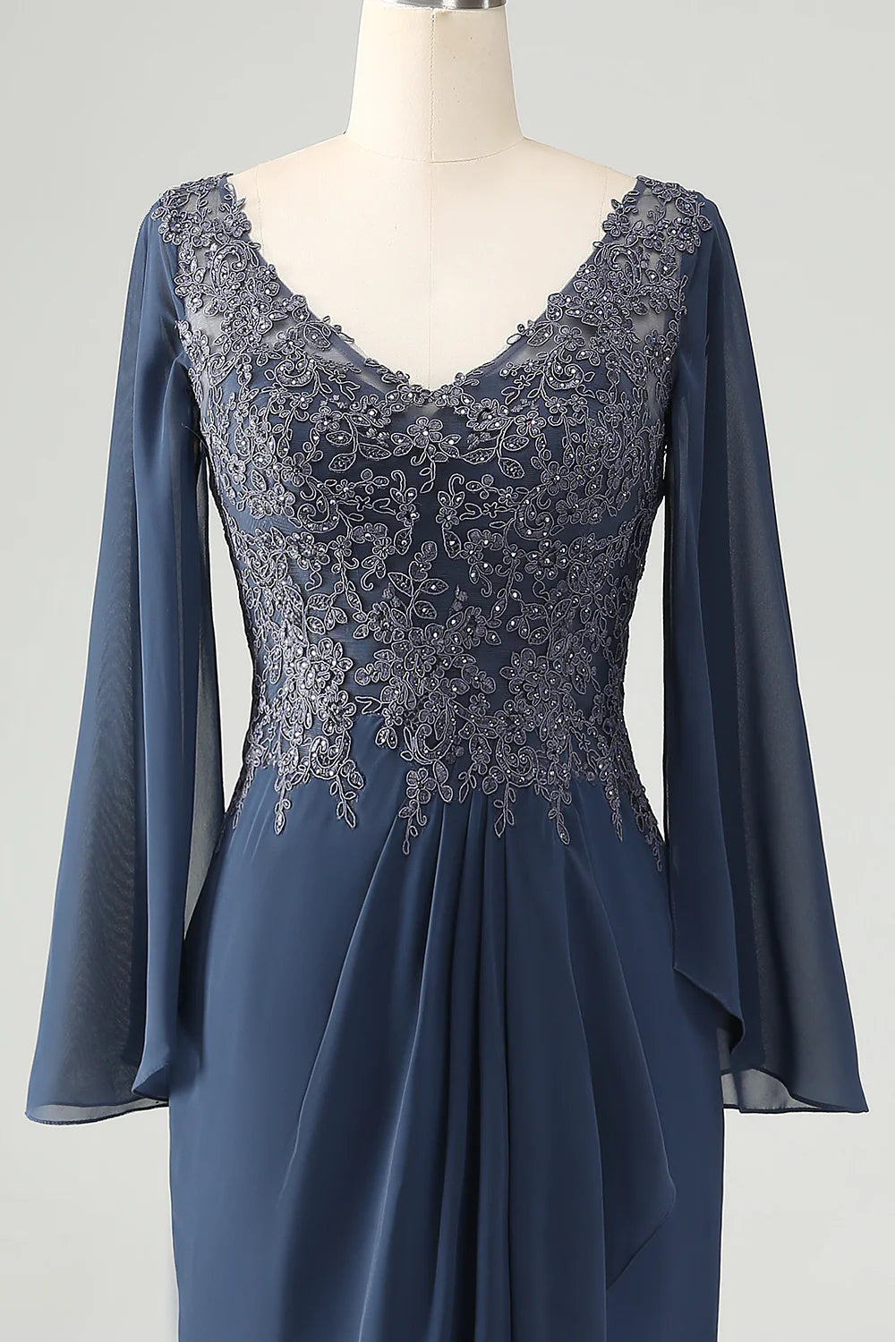 Full length view of the beaded V-neck mermaid dress.