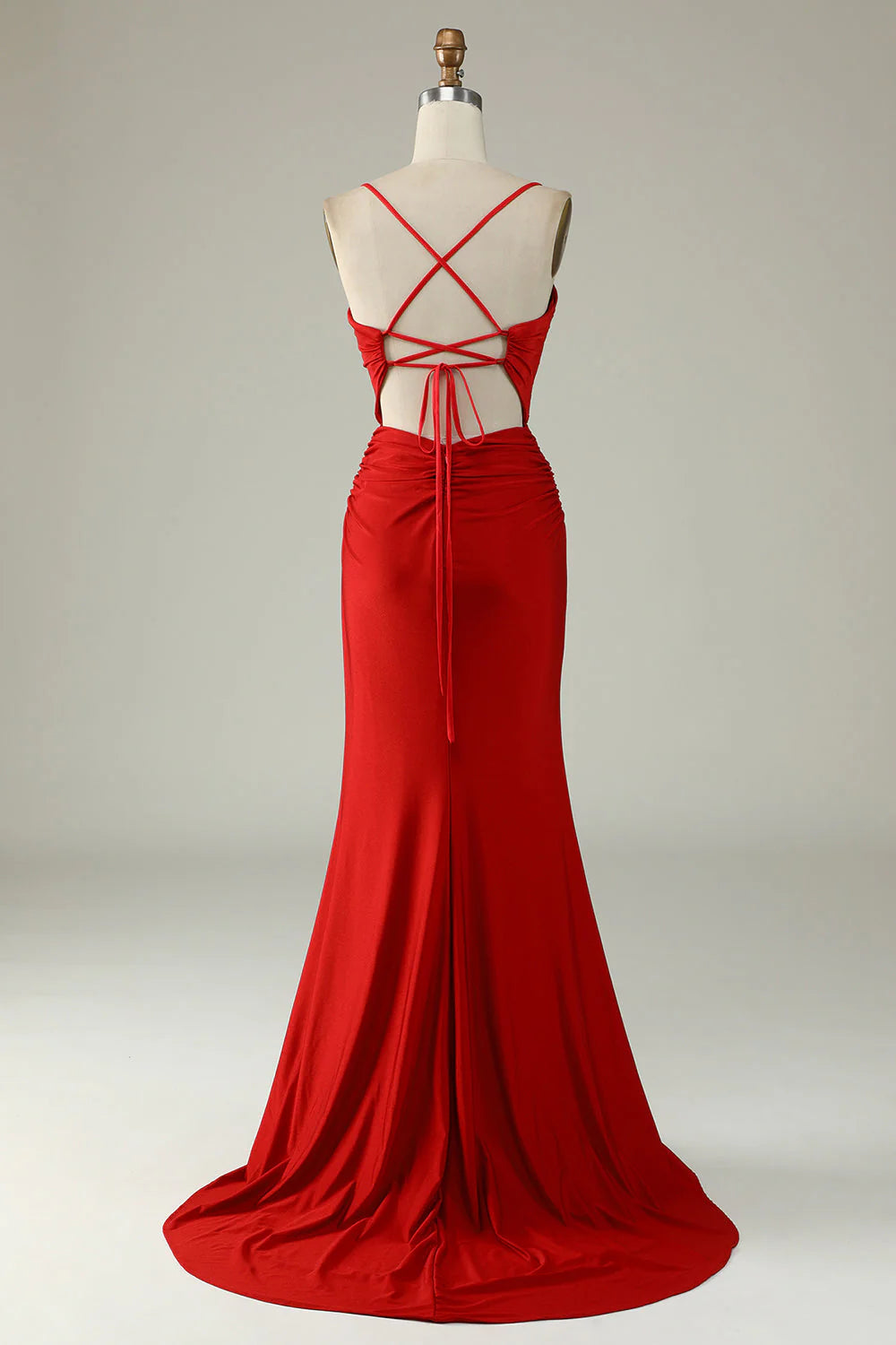 Side view of the red mermaid V-neck prom dress.