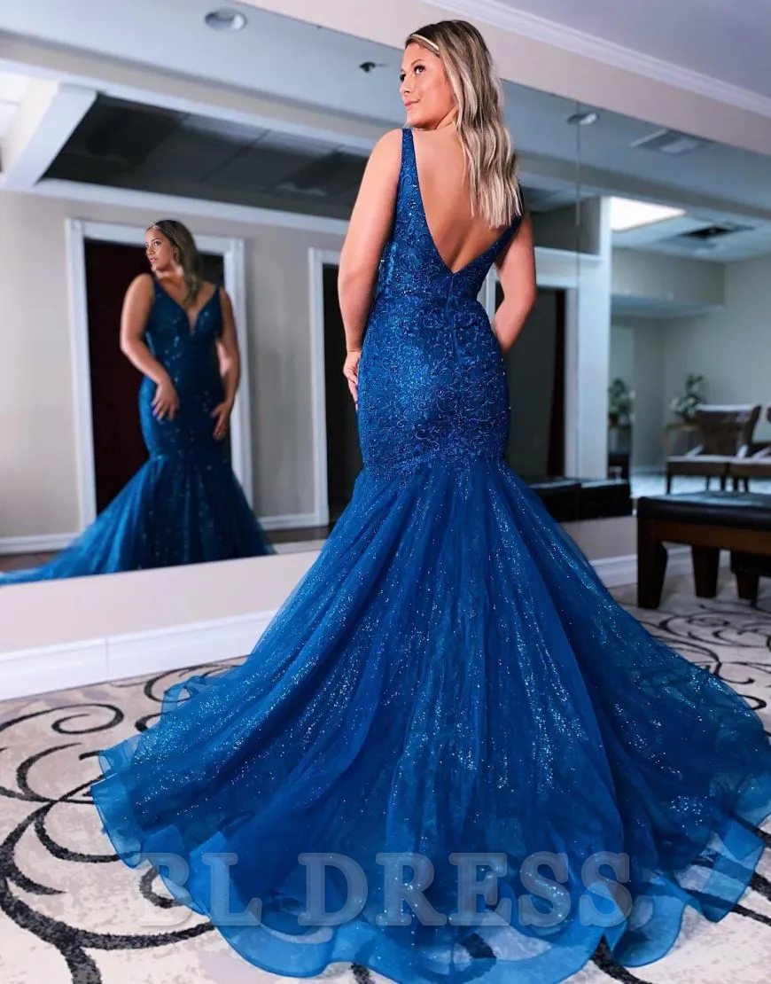 Side view of a woman wearing the navy blue mermaid V-neck formal dress with beading.