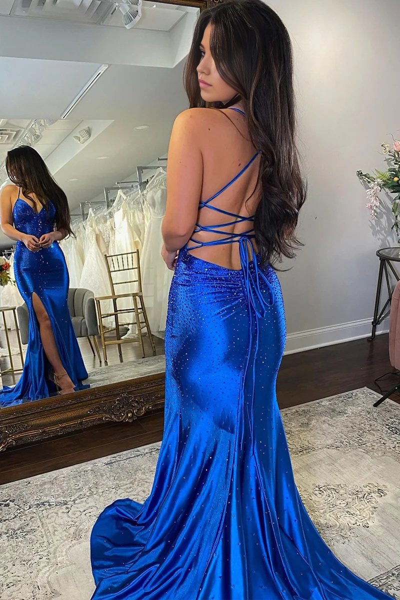Back view of royal blue satin evening gown, showcasing mermaid silhouette.