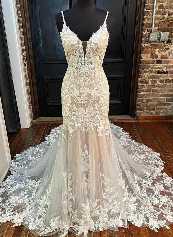 Elegant mermaid V-neck lace wedding dress with a floor-length silhouette.