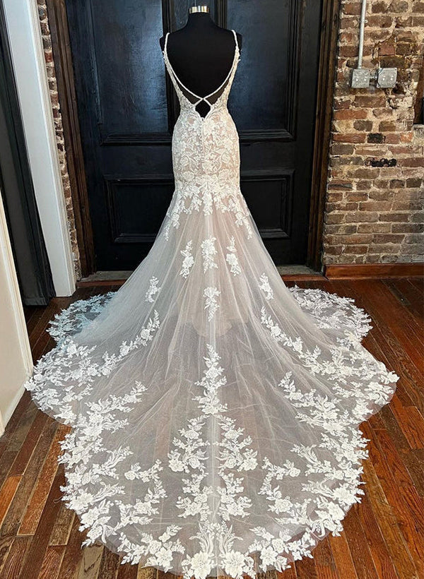 Back view of a mermaid lace wedding dress featuring a V-neck design.