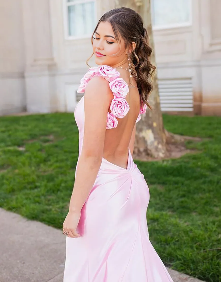 Back view of the pink mermaid formal dress, highlighting the train and floral appliques.