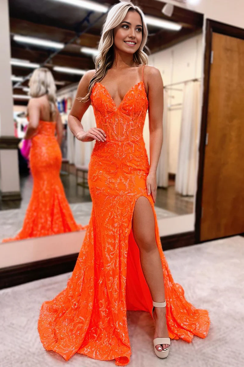 Back view of hot pink sequin mermaid evening gown.