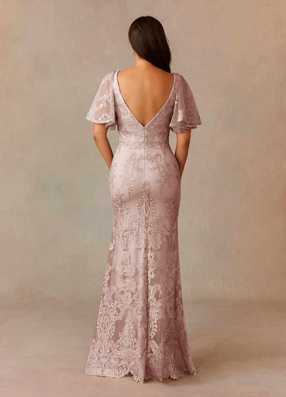 Side view of dusty rose mermaid formal dress.