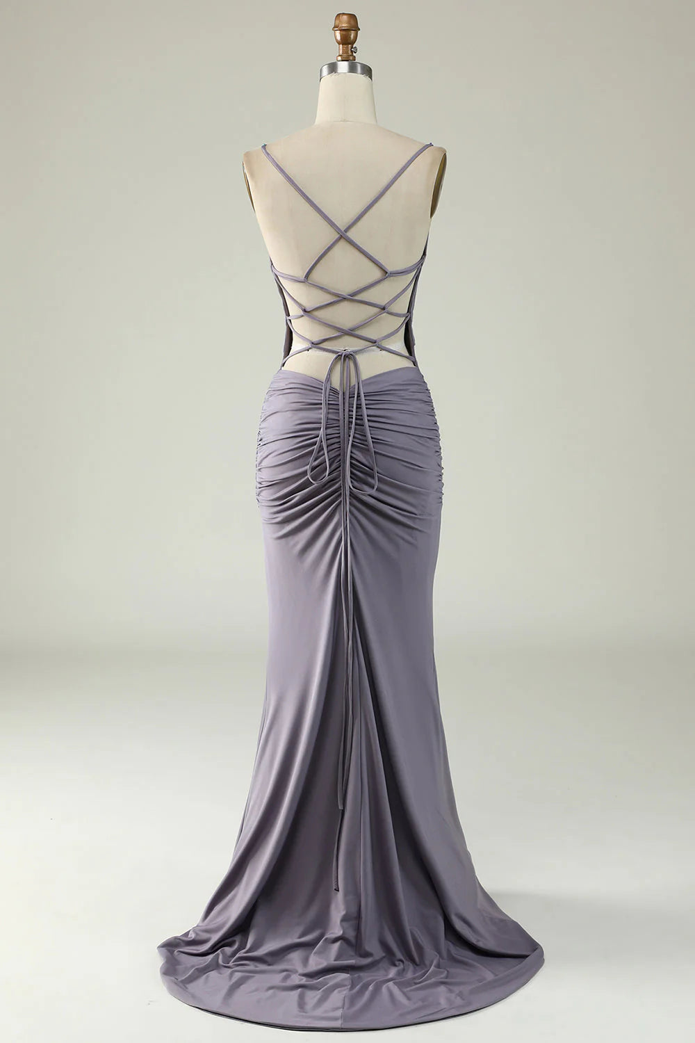 Side view of the grey-purple mermaid gown, showcasing its flowing silhouette.