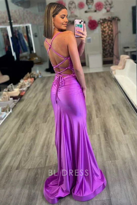 Side view of a long purple mermaid prom dress.