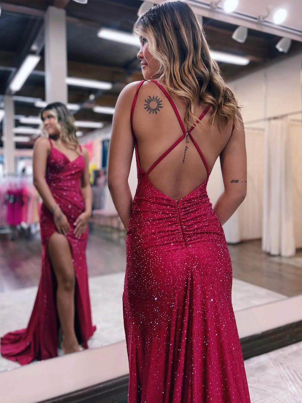Back view of the long V-neck mermaid prom dress.