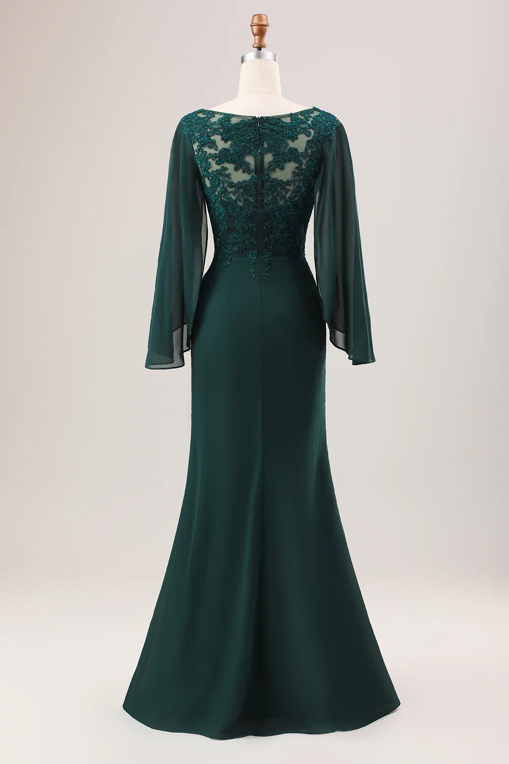 Dark green glitter chiffon mermaid gown, showcasing the long sleeves.