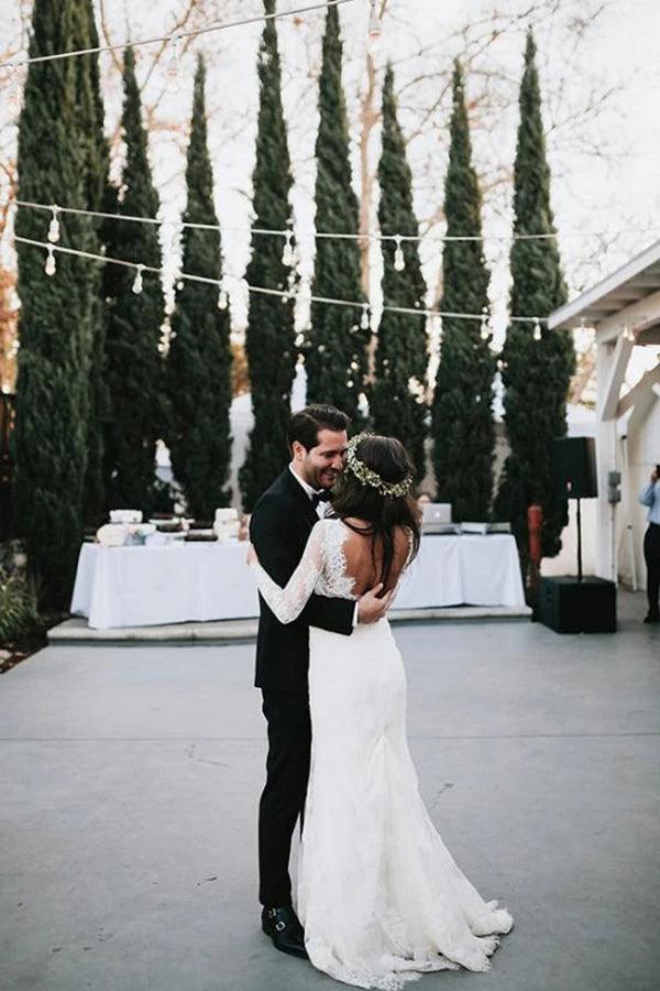Side view of mermaid V-neck long sleeve lace wedding dress.