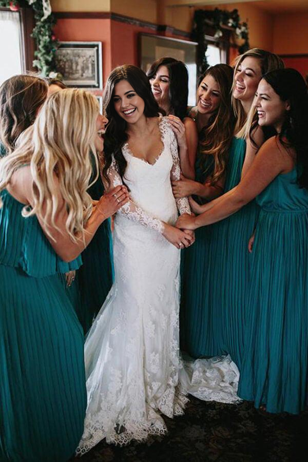 Back view of mermaid V-neck long sleeve lace wedding dress.