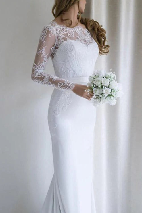 Back view of a mermaid wedding dress, showcasing the intricate lace details on the sleeves and the elegant train.