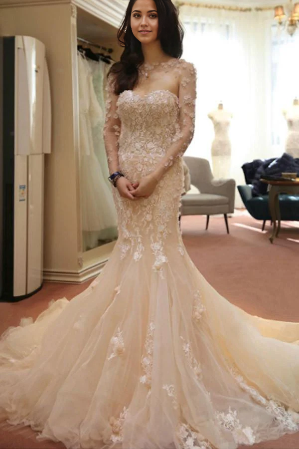 Mermaid wedding dress with sheer floral long sleeves and open back.