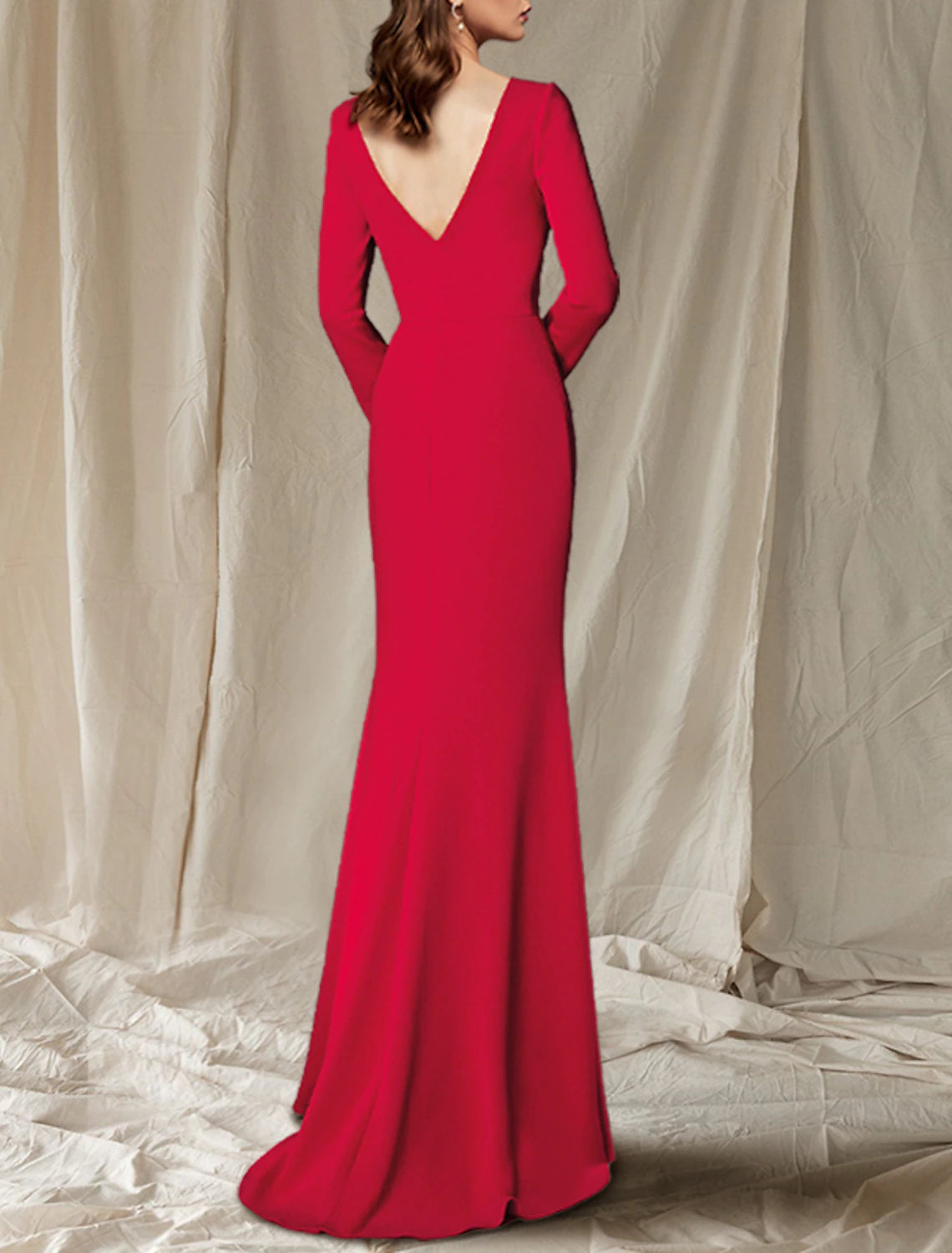 Close-up of the long sleeve with button details on the elegant Mother of the Bride gown.