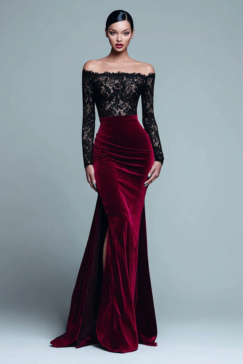 Model wearing black and burgundy velvet mermaid dress with long sleeves.