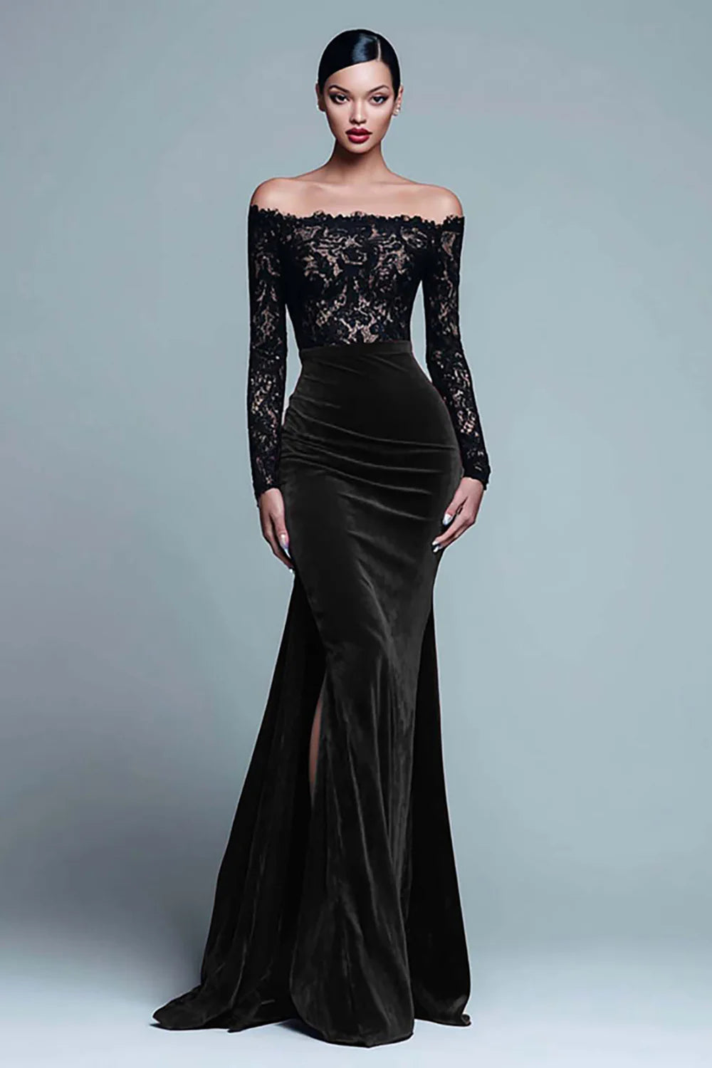 Model posing in elegant black and burgundy velvet formal dress.