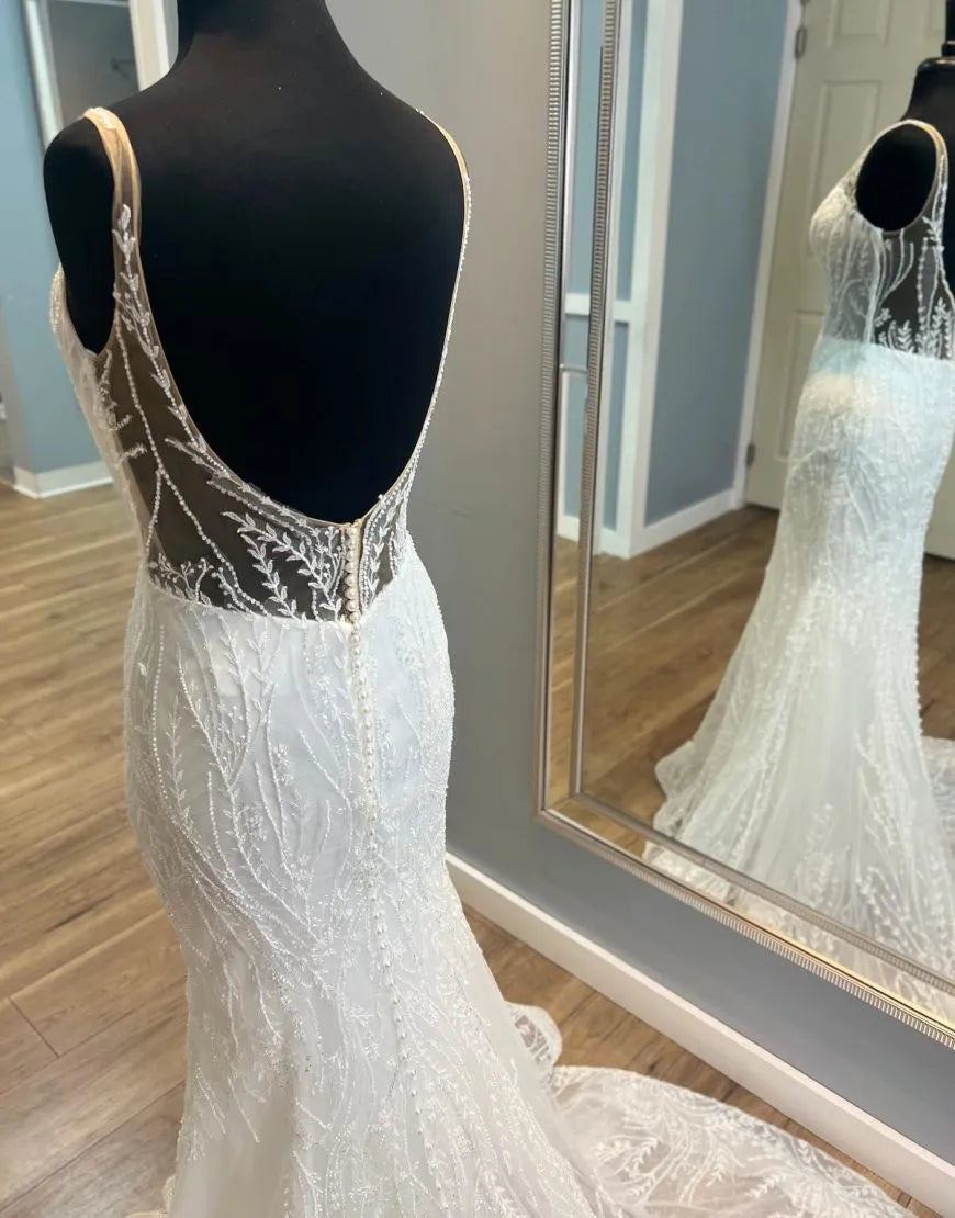Back view of the Ivory Mermaid V-Neck wedding dress showing court train and lace.