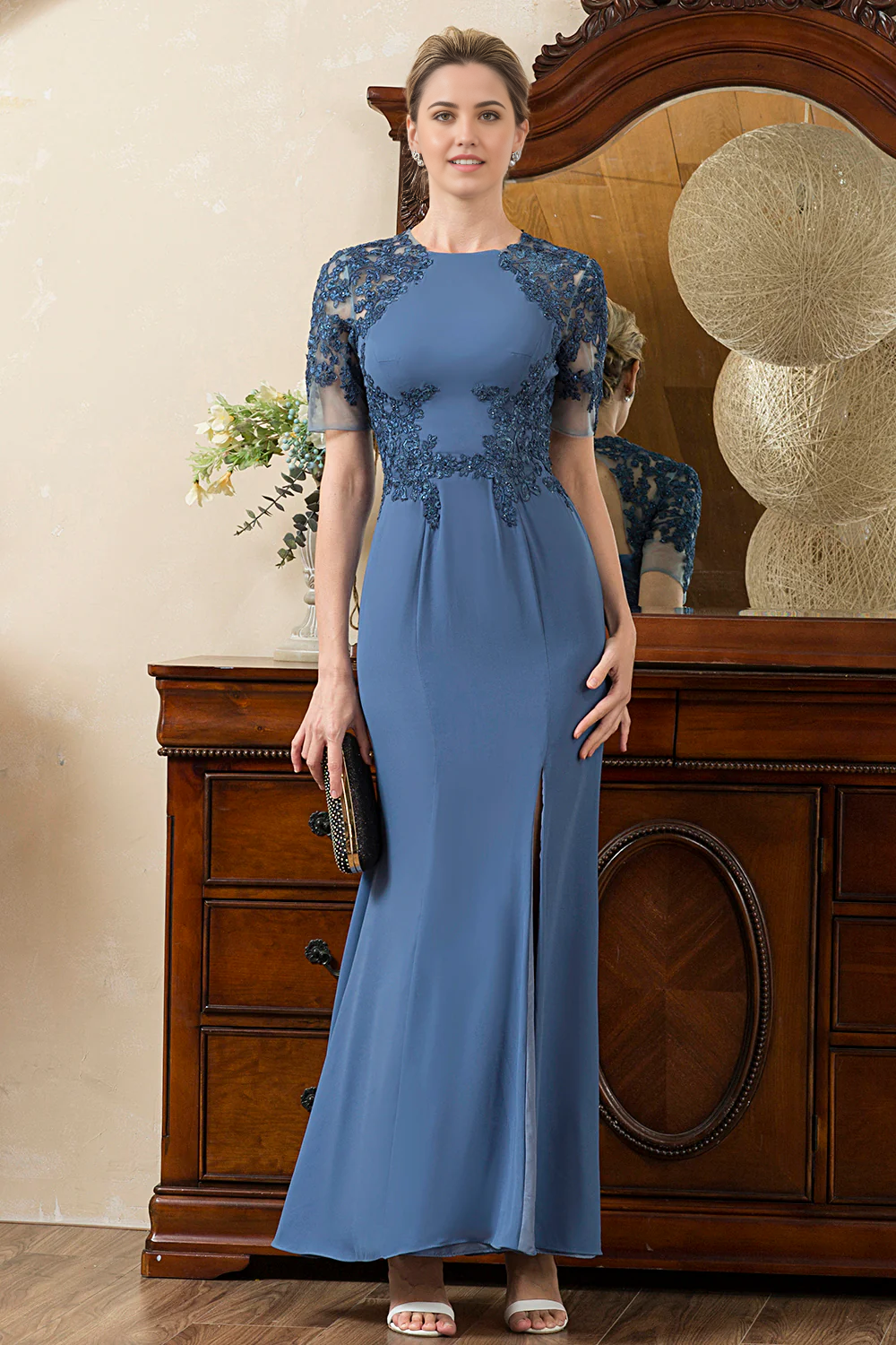 Side view of the mermaid Mother of the Bride dress, highlighting the high leg slit.