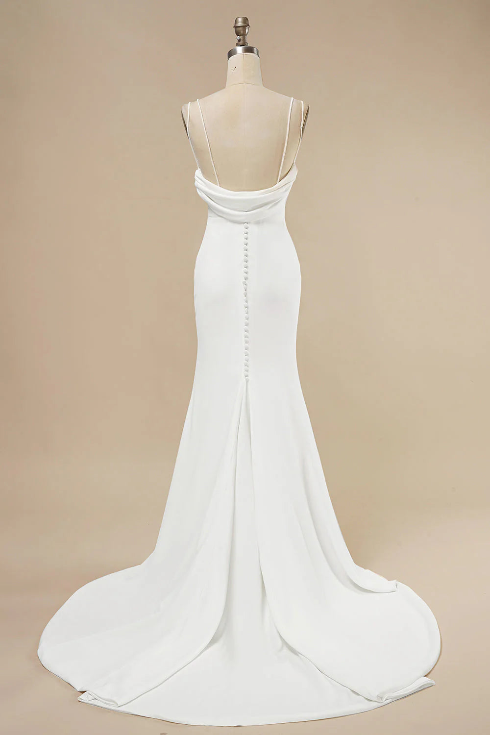 Back view of a ruffled mermaid wedding dress.