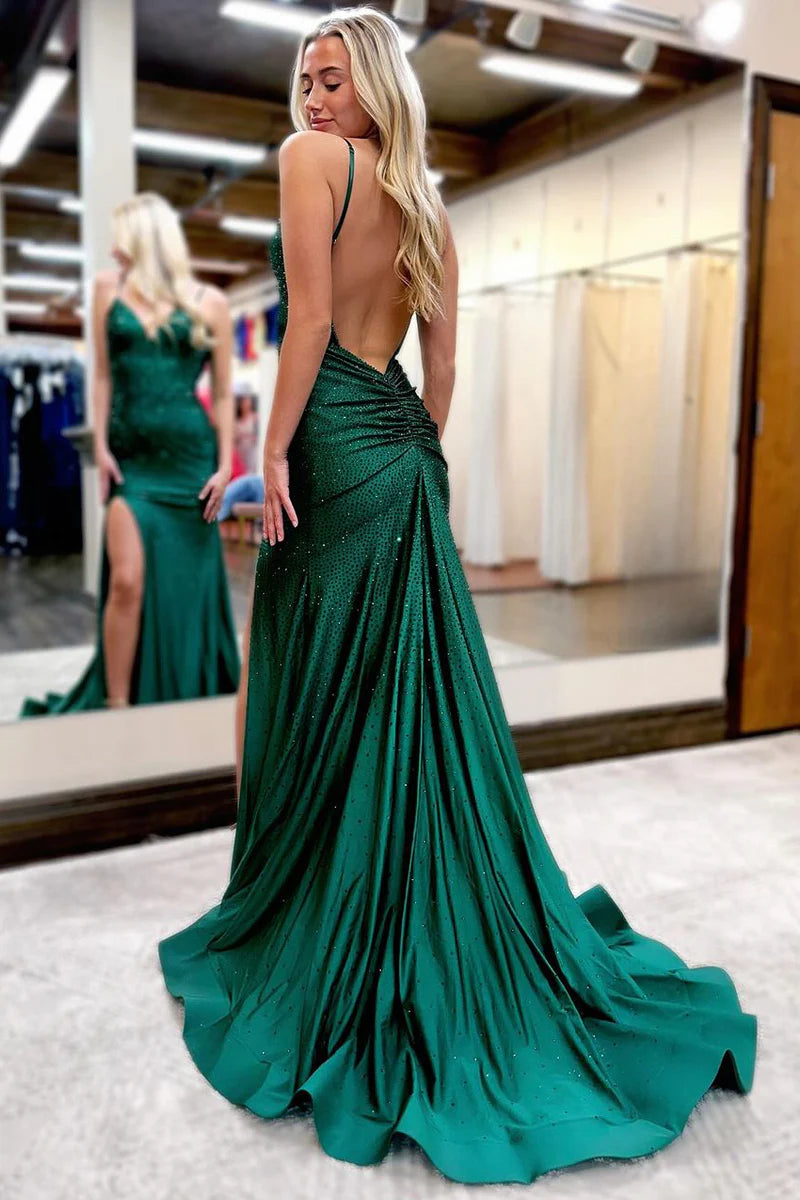 Close-up of the V-neckline and beading on a satin dress.